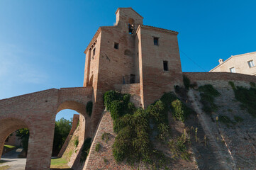 Long staircase leading to a medieval castle and big arcs under it