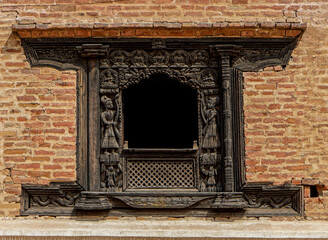 Nepal, Bhaktapur, carved wooden window in the Durbar Square