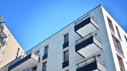 Modern apartment building in sunny day. Exterior, residential house facade.