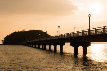Fototapeta premium Silhouette of Takeshima in Gamagori City, Aichi Prefecture at dusk