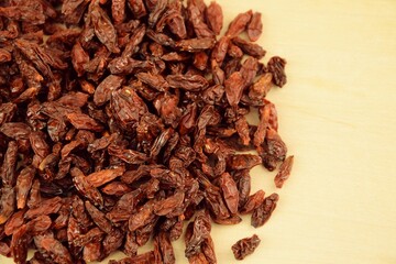 Dried goji berries on  wooden background, super food, organic