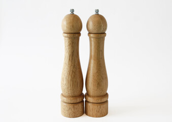 salt and pepper mill, wooden cruet set white background full depth of field