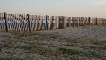 wooden fence near the sea