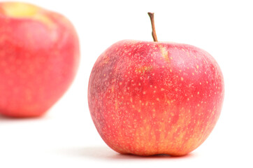 Ripe apples on a white background