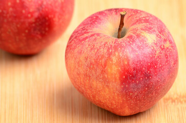 Fototapeta na wymiar Ripe apples on wooden background