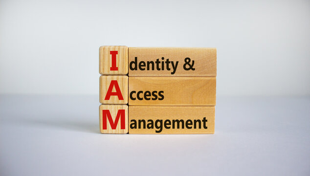 IAM, Identity And Access Management Symbol. Concept Words 'IAM, Identity And Access Management' On Cubes And Blocks On A Beautiful White Background. Business And IAM Concept. Copy Space.