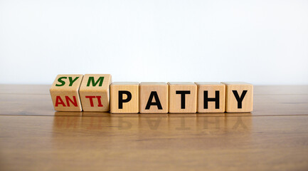 From antipathy to sympathy. Turned cubes and changed the word 'antipathy' to 'sympathy'. Beautiful...
