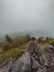 person in the top of mountains