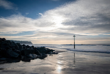 the groyne markers of Borth beach © JoeE Jackson