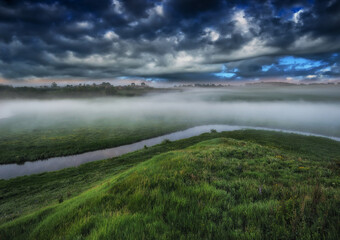 Beautiful spring sunrise over river banks