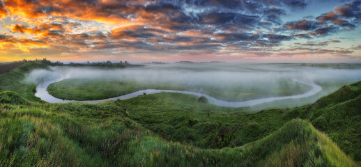 Beautiful spring sunrise over river banks