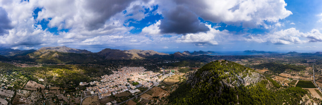Spain, Balearic Islands, Majorca, Pollena, Town and&not;&dagger;Tramuntana&not;&dagger;Mountains, aerial view