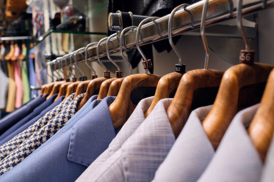 Row of shirts on rack in tailors boutique