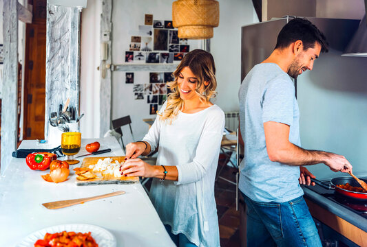 Man and woman cooking