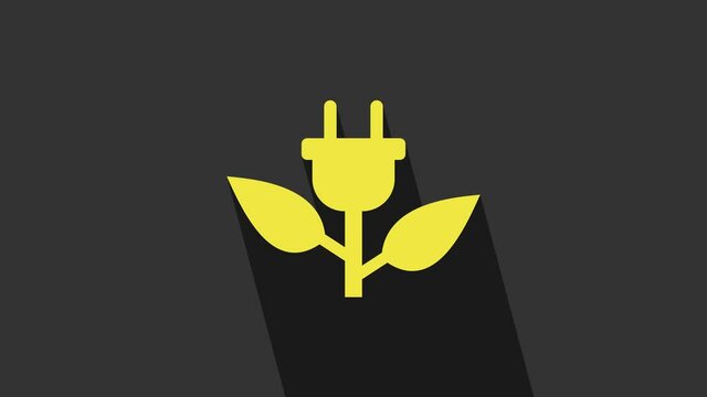 Yellow Electric saving plug in leaf icon isolated on grey background. Save energy electricity icon. Environmental protection icon. Bio energy. 4K Video motion graphic animation