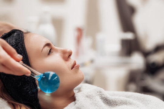 The woman is massaged face and body.