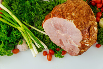 Whole pork ham with fresh vegetables. Healthy food.