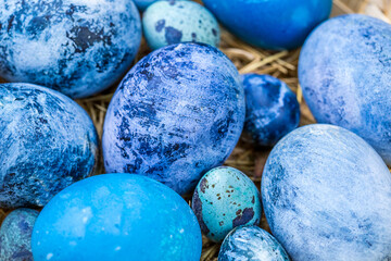 Blue Easter eggs close-up, selective focus, shallow depth of field.