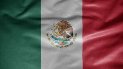 Mexican flag waving in the wind. Close up of Mexico banner blowing, soft silk.