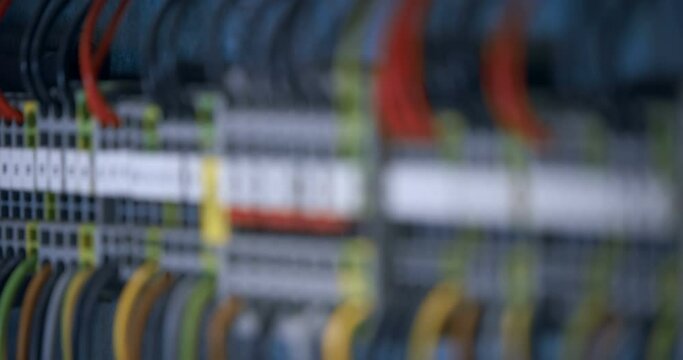 Electrical panel with many wires, electrical parts, automatic switches, breakers, residual current devices, fuses, terminals 