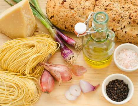 Pasta, cheese, garlic and olive oil, studio shot