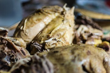 close up detail of boiled chicken with soft focus background prepared for meal
