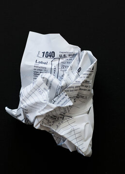 Studio shot of crumpled document