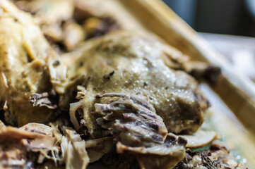 close up detail of boiled chicken with soft focus background prepared for meal