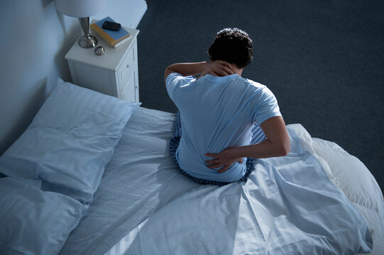 Man sitting on bed