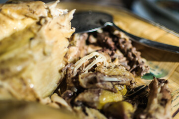 close up detail of boiled chicken with soft focus background prepared for meal