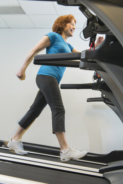 Senior woman on treadmill