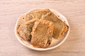 Black glutinous rice cake on the plate