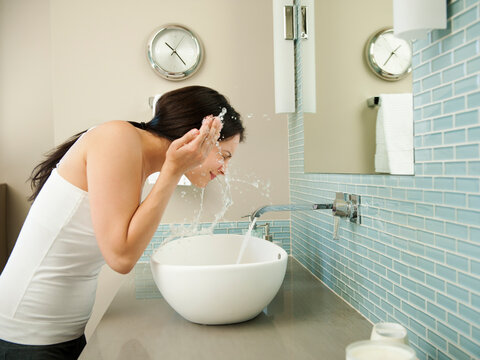 Young attractive woman in her morning toilette