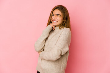 Young skinny caucasian teenager girl smiling happy and confident, touching chin with hand.