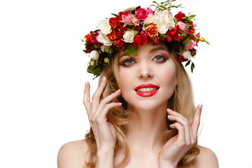 Naklejka premium Girl with flowers. Woman with spring blooming wreath. Model and flowers. Summer lady