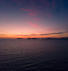 Beautiful sunset, aerial view of the beach, acapulco city seen from above. Travel and vacation concept. Colorful sunset on the beach