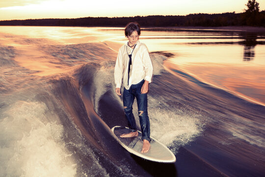 Boy wakeboarding on Lake Greeson