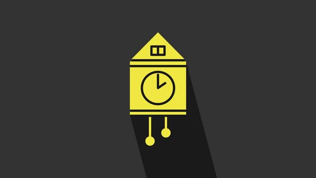 Yellow Retro wall watch icon isolated on grey background. Cuckoo clock sign. Antique pendulum clock. 4K Video motion graphic animation