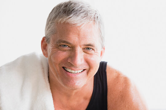 Portrait of smiling mature man in gym