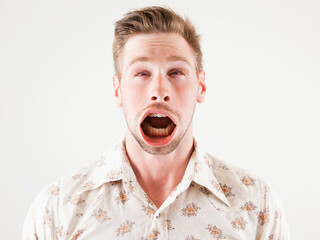 Studio shot of man with windblown mouth