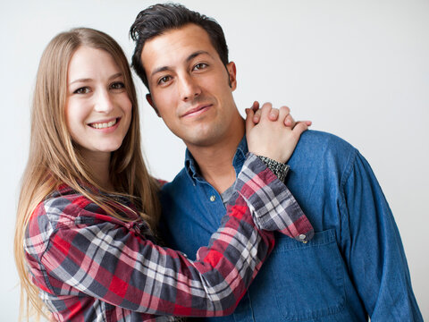 Studio Shot portrait of young couple