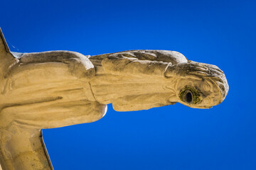 Gargoyle on the facade of the Jacques Coeur Palace, a gothic building, emblematic of the city of Bourges, located in the Berry region of France