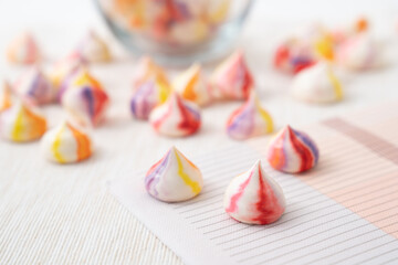 Homemade colourful stripes French vanilla meringue cookies