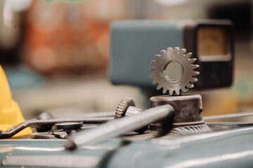 large industrial gear concept in dark metallic and blue toning