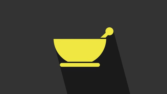 Yellow Mortar and pestle icon isolated on grey background. 4K Video motion graphic animation