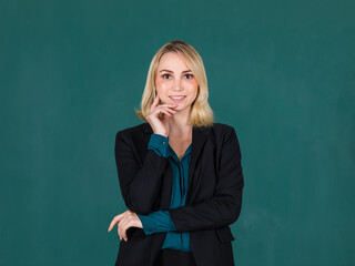 Portrait of cute and elegance executive woman in black jacket standing and smile to camera with self-confident
