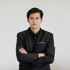 Portrait of young and handsome good looking Asian man fold his arms on chest on white background.