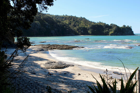 Rocky foreshore at Otarawairere Bay near Ohope Beach in New Zealand