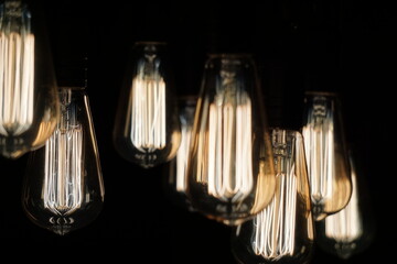 Fototapeta na wymiar lightbulbs on black background