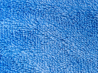 Soft terry cloth blue fiber loops close up.